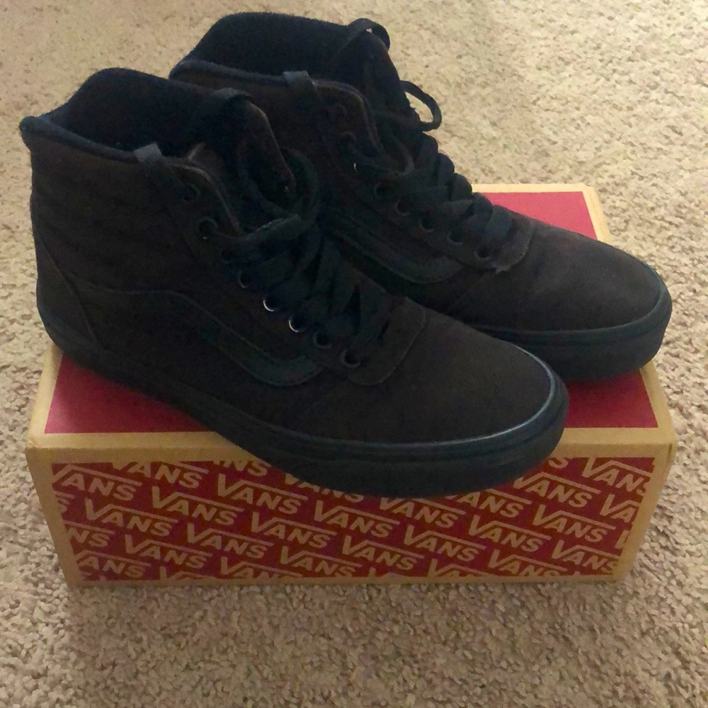 Black Vans. Used in good condition size 7.5 mens